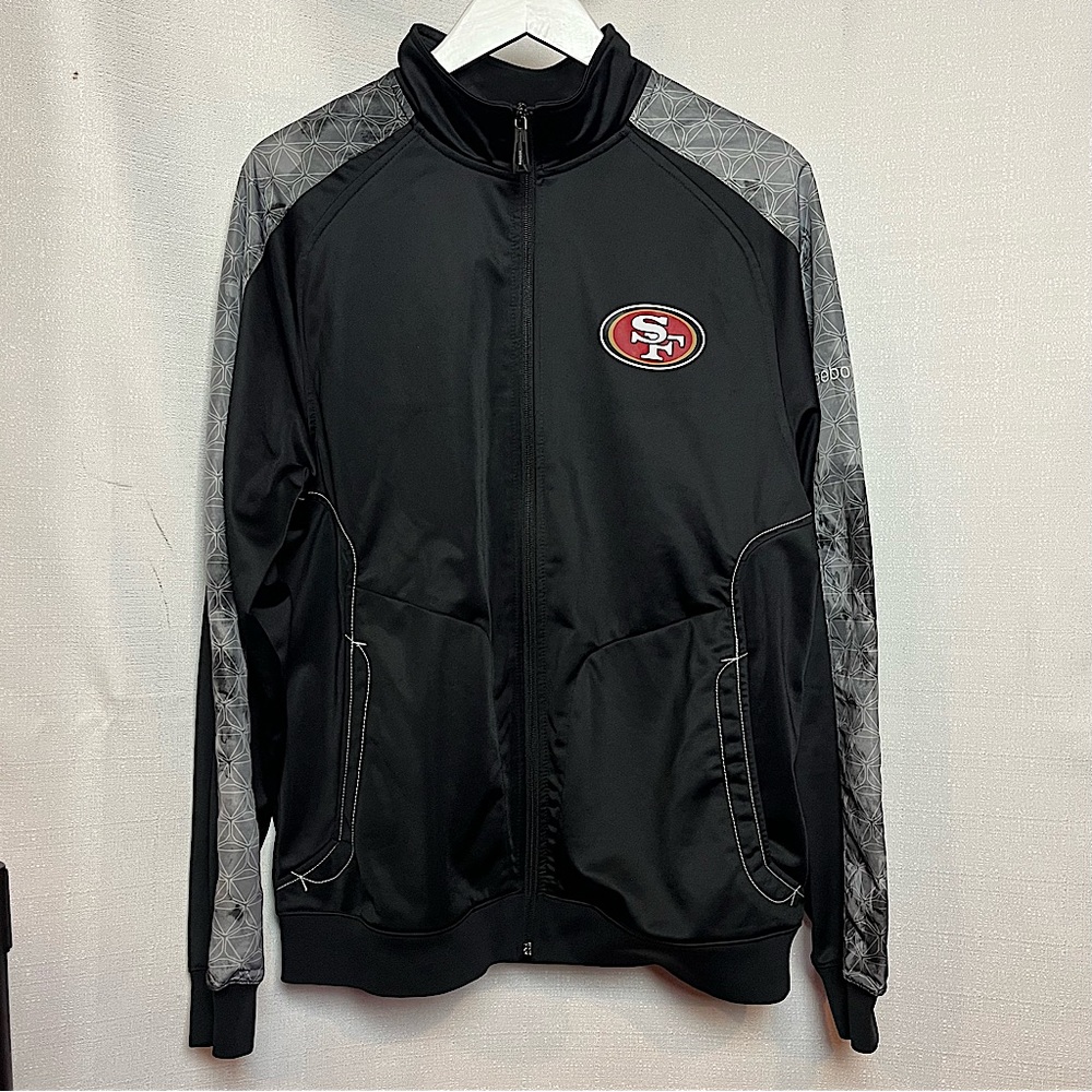 NFL 49er Jacket with front and back logos. Men’s Small in Black by Reebok.
